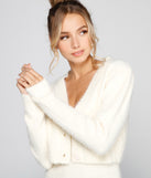 You’ll look stunning in the Cozy Trends Eyelash Knit Cardigan when paired with its matching separate to create a glam clothing set perfect for a New Year’s Eve Party Outfit or Holiday Outfit for any event!