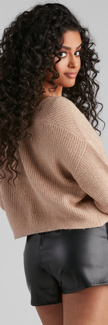 With fun and flirty details, Sparkly Twist Sweater Top shows off your unique style for a trendy outfit for the summer season!