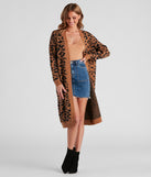 The trendy Into the Wild Leopard Duster Cardigan is the perfect pick to create a holiday outfit, new years attire, cocktail outfit, or party look for any seasonal event!