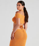With fun and flirty details, Sunset Beauty Halter Crop Top shows off your unique style for a trendy outfit for the summer season!