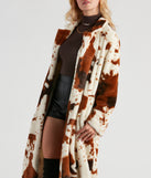 Total Icon Cow Faux Fur Long Coat helps create the best summer outfit for a look that slays at any event or occasion!