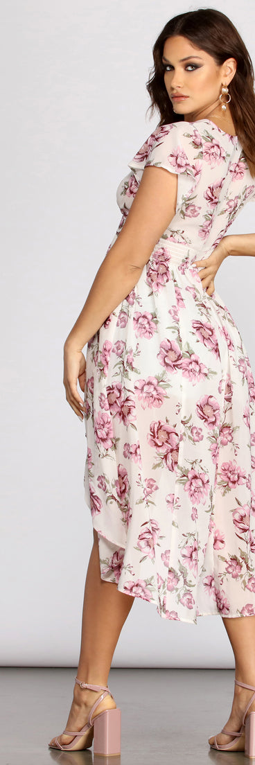 With fun and flirty details, Flutter Sleeve Floral High Low Top shows off your unique style for a trendy outfit for the summer season!