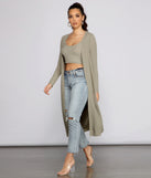 You’ll look stunning in the Casual And Cozy Ribbed Knit Duster when paired with its matching separate to create a glam clothing set perfect for parties, date nights, concert outfits, back-to-school attire, or for any summer event!