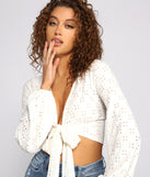 With fun and flirty details, Eyelet Knit Tie Front Crop Top shows off your unique style for a trendy outfit for the summer season!