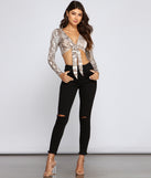 With fun and flirty details, Vamp It Up Snake Tie Front Top shows off your unique style for a trendy outfit for the summer season!
