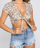 With fun and flirty details, Cinched And Chic Floral Tie Front Top shows off your unique style for a trendy outfit for the summer season!