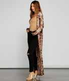 Stylish And Sassy Snake Knit Duster is a trendy pick to create 2023 festival outfits, festival dresses, outfits for concerts or raves, and complete your best party outfits!