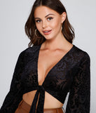 With fun and flirty details, Classic Beauty Tie-Front Burnout Top shows off your unique style for a trendy outfit for the summer season!