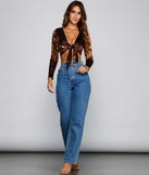 With fun and flirty details, Alluringly Chic Tie-Front Top shows off your unique style for a trendy outfit for the summer season!