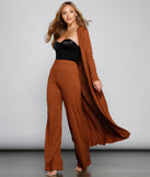 You’ll look stunning in the The Everyday Long Sleeve Knit Duster when paired with its matching separate to create a glam clothing set perfect for parties, date nights, concert outfits, back-to-school attire, or for any summer event!