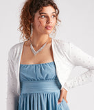 With fun and flirty details, Elegant Touch Pearl Embellished Bolero shows off your unique style for a trendy outfit for the summer season!