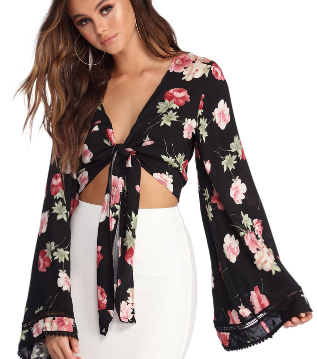 With fun and flirty details, Ring Around In Florals Top shows off your unique style for a trendy outfit for the summer season!