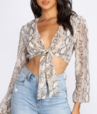 Snake Print Long Sleeve Crop Top is a trendy pick to create 2023 festival outfits, festival dresses, outfits for concerts or raves, and complete your best party outfits!