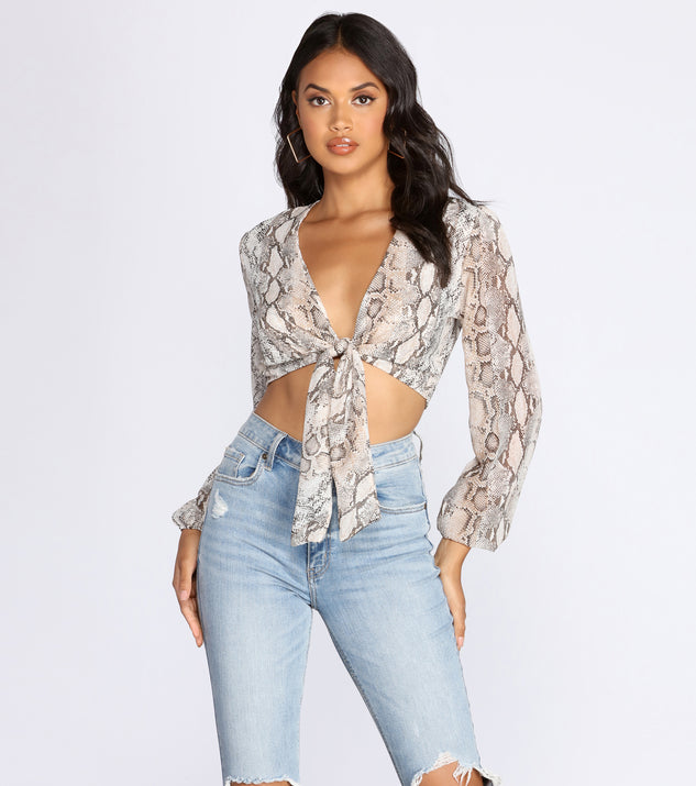 With fun and flirty details, Snake Print Long Sleeve Crop Top shows off your unique style for a trendy outfit for the summer season!