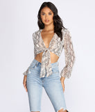 With fun and flirty details, Snake Print Long Sleeve Crop Top shows off your unique style for a trendy outfit for the summer season!