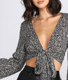 With fun and flirty details, Leopard Print Tie Front Blouse shows off your unique style for a trendy outfit for the summer season!