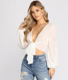 With fun and flirty details, Boho-Chic Tie-Front Top shows off your unique style for a trendy outfit for the summer season!