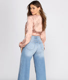 With fun and flirty details, Satin Floral Tie Front Top shows off your unique style for a trendy outfit for the summer season!