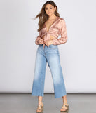 With fun and flirty details, Satin Floral Tie Front Top shows off your unique style for a trendy outfit for the summer season!