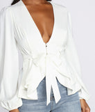With fun and flirty details, Simply Irresistible Zip Front Ruffled Blouse shows off your unique style for a trendy outfit for the summer season!