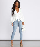 With fun and flirty details, Simply Irresistible Zip Front Ruffled Blouse shows off your unique style for a trendy outfit for the summer season!