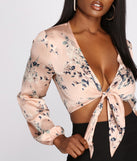 With fun and flirty details, Blooming Beauty Satin Tie Front Top shows off your unique style for a trendy outfit for the summer season!