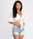 With fun and flirty details, Flowy Flutter Sleeve Tie Front Top shows off your unique style for a trendy outfit for the summer season!