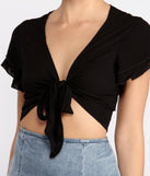 With fun and flirty details, Tied Down Flutter Sleeve Tie Front Top shows off your unique style for a trendy outfit for the summer season!