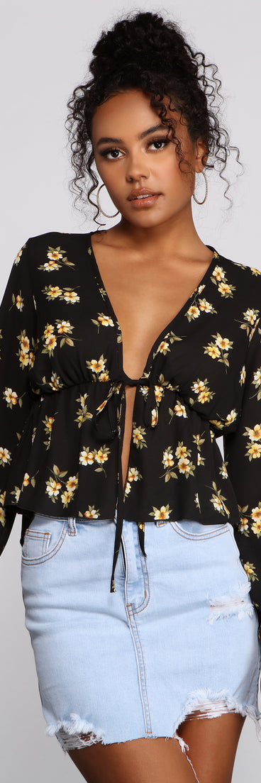 With fun and flirty details, Fall In Love With Floral Tie-Front Blouse shows off your unique style for a trendy outfit for the summer season!