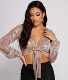 With fun and flirty details, Fab Sequin Tie Front Top shows off your unique style for a trendy outfit for the summer season!