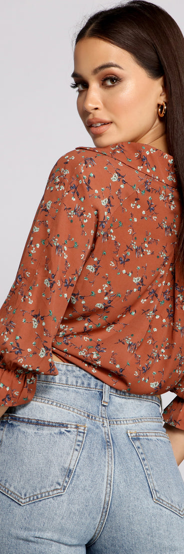 With fun and flirty details, Floral Charm Tie Front Top shows off your unique style for a trendy outfit for the summer season!