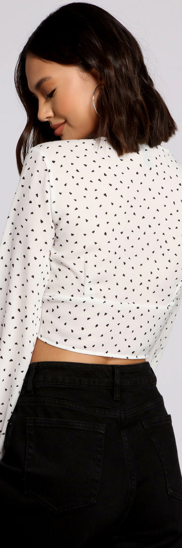 With fun and flirty details, Retro Feels Tie Front Top shows off your unique style for a trendy outfit for the summer season!