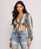 With fun and flirty details, Chic Satin Snake Print Crop Top shows off your unique style for a trendy outfit for the summer season!