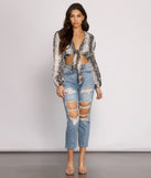 With fun and flirty details, Chic Satin Snake Print Crop Top shows off your unique style for a trendy outfit for the summer season!