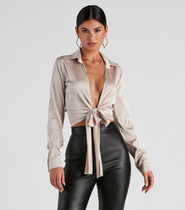 With fun and flirty details, the So Sleek Satin Tie-Front Blouse shows off your unique style for a trendy outfit for the spring or summer season!