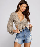 The trendy Sassy Style Tie-Front Top is the perfect pick to create a holiday outfit, new years attire, cocktail outfit, or party look for any seasonal event!