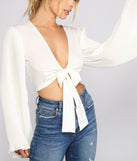 With fun and flirty details, Bell Sleeve Beauty Chiffon Tie-Front Top shows off your unique style for a trendy outfit for the summer season!