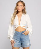 With fun and flirty details, Twist Of Fab Gauze Tie Front Crop Top shows off your unique style for a trendy outfit for the summer season!