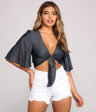 With fun and flirty details, Flirty And Fluttery Tie Front Top shows off your unique style for a trendy outfit for the summer season!