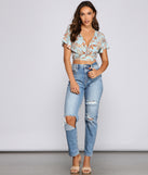 With fun and flirty details, Boho Moment Paisley Tie Front Top shows off your unique style for a trendy outfit for the summer season!