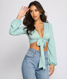 The trendy Back To Basics Tie Front Gauze Top is the perfect pick to create a holiday outfit, new years attire, cocktail outfit, or party look for any seasonal event!