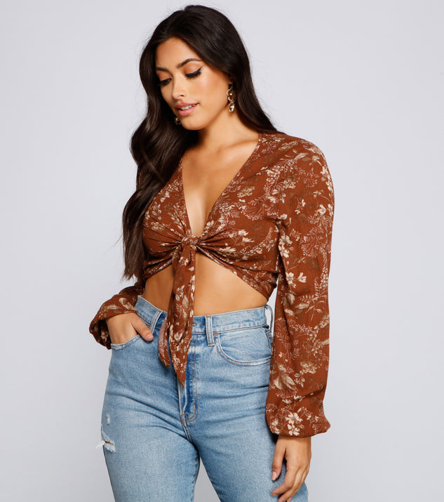 The trendy Caught In A Floral Gaze Crop Top is the perfect pick to create a holiday outfit, new years attire, cocktail outfit, or party look for any seasonal event!