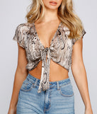 With fun and flirty details, Edgy Glam Snake Print Tie Front Top shows off your unique style for a trendy outfit for the summer season!