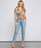 With fun and flirty details, Edgy Glam Snake Print Tie Front Top shows off your unique style for a trendy outfit for the summer season!
