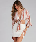 With fun and flirty details, Breezy Striped Tie-Front Top shows off your unique style for a trendy outfit for the summer season!