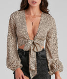 With fun and flirty details, Chase The Cheetah Tie-Front Top shows off your unique style for a trendy outfit for the summer season!