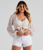 With fun and flirty details, Floral Love Tie-Front Top shows off your unique style for a trendy outfit for the summer season!