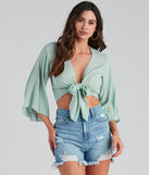 With fun and flirty details, Breezy Style Kimono Tie-Front Top shows off your unique style for a trendy outfit for the summer season!