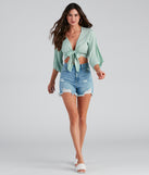 With fun and flirty details, Breezy Style Kimono Tie-Front Top shows off your unique style for a trendy outfit for the summer season!