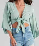 With fun and flirty details, Breezy Style Kimono Tie-Front Top shows off your unique style for a trendy outfit for the summer season!